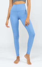 Light blue full-length high-waisted leggings with smooth, seamless fabric and contour lines.