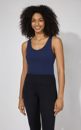 Women's navy blue tank top with built-in support bra, fitted style with scoop neckline.