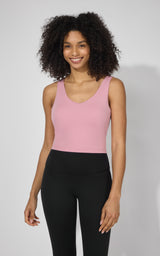 Pink plum tank top with built-in bra, scoop neckline, and wide straps on model.