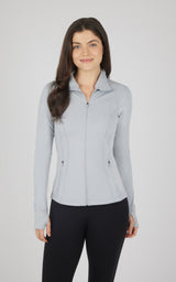 Light gray full zip runner jacket with high collar and fitted silhouette on female model.