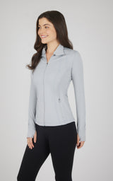 Light gray full zip runner jacket with high collar and side pockets on woman.