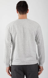 Men's heather grey terry brushed long sleeve crewneck top, back view.