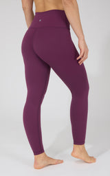 Women's plum violet high-waist Power Flex leggings with smooth, stretchy fabric and no pockets.