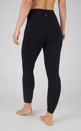 Black high-waist Power Flex leggings with smooth, fitted design viewed from back.