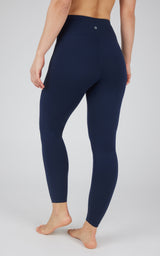 Dark navy high-waisted seamless leggings with a smooth matte finish and no visible pockets.