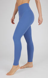 Mid-rise full length blue leggings with smooth, stretchy fabric and seamless waist panel.