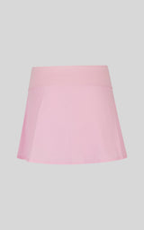 Light pink pleated girls skort with smooth waistband and A-line silhouette.