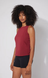 Women's Tibetan Red sleeveless laser cut active tank with high neckline and slim fit.