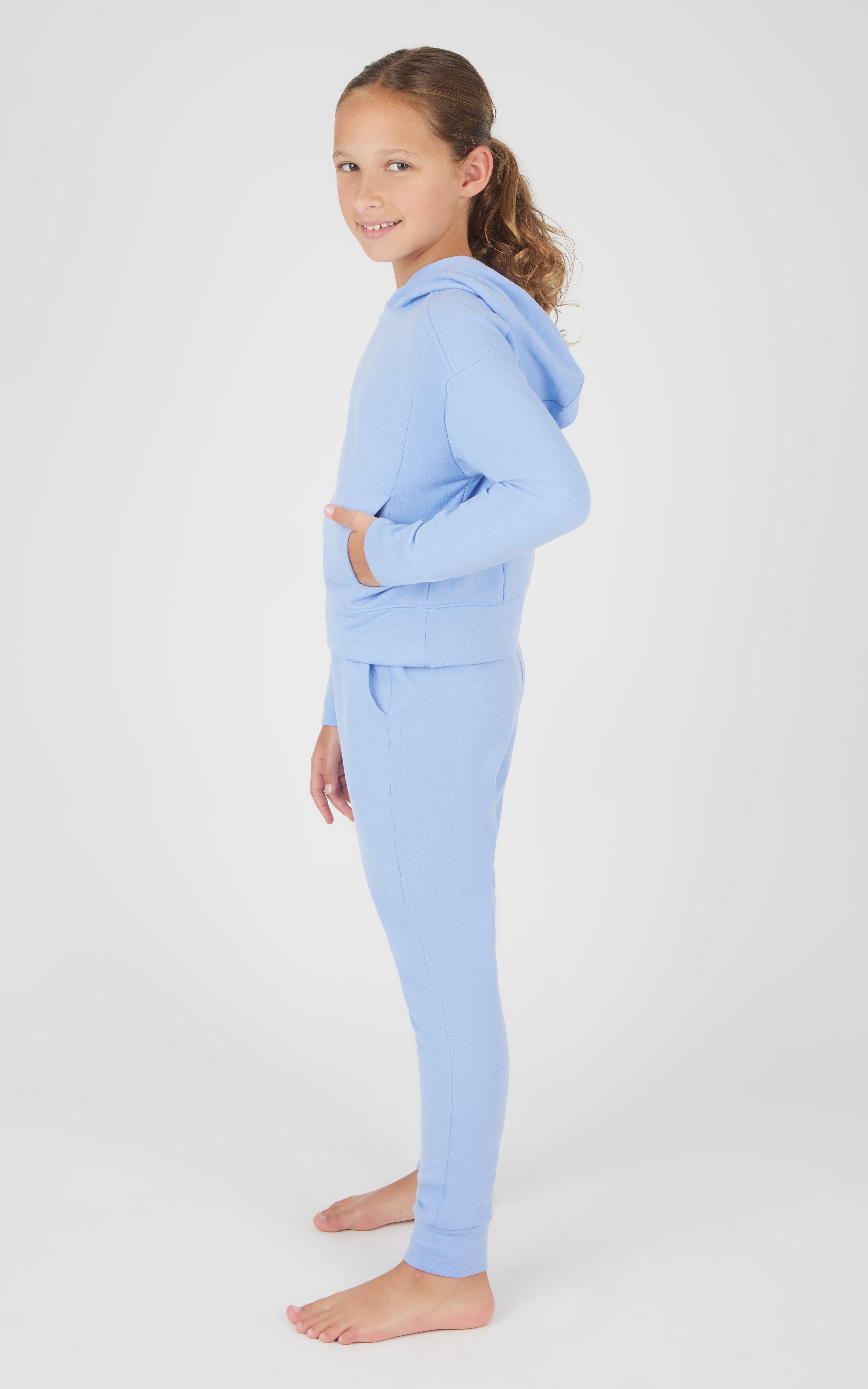 Girls light blue terry brushed hoodie and jogger set with front pockets and fitted cuffs.