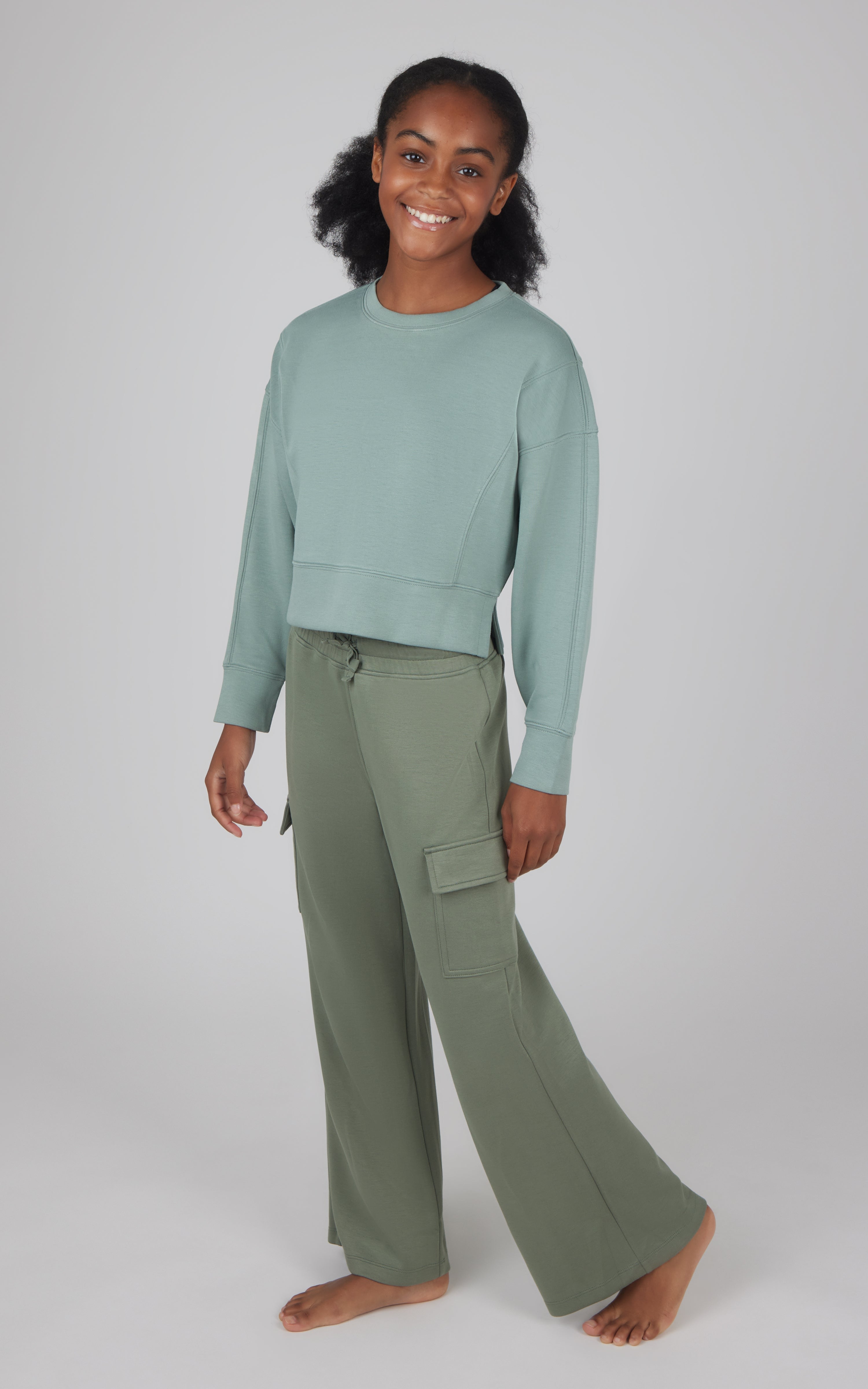 Girls softlite cropped pullover in chino green with wide-leg cargo pants in agave green.
