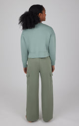 Girls cropped pullover in soft chinoiserie green with wide-leg cargo pants in matching agave green.