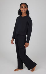 Girls black Softlite cropped pullover with matching wide-leg cargo pants, relaxed fit.
