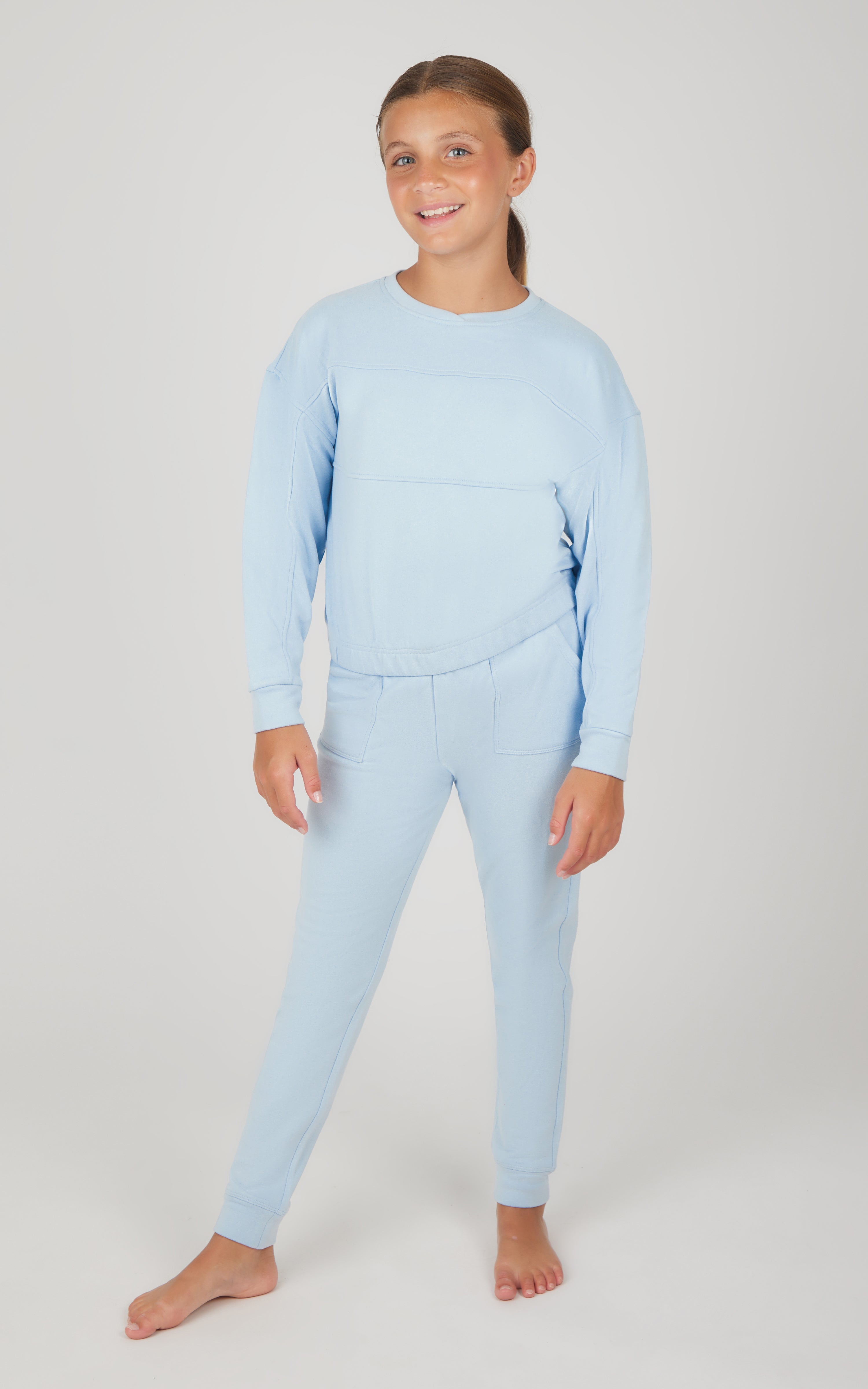 Girls light blue melange long sleeve top and matching jogger pants set.