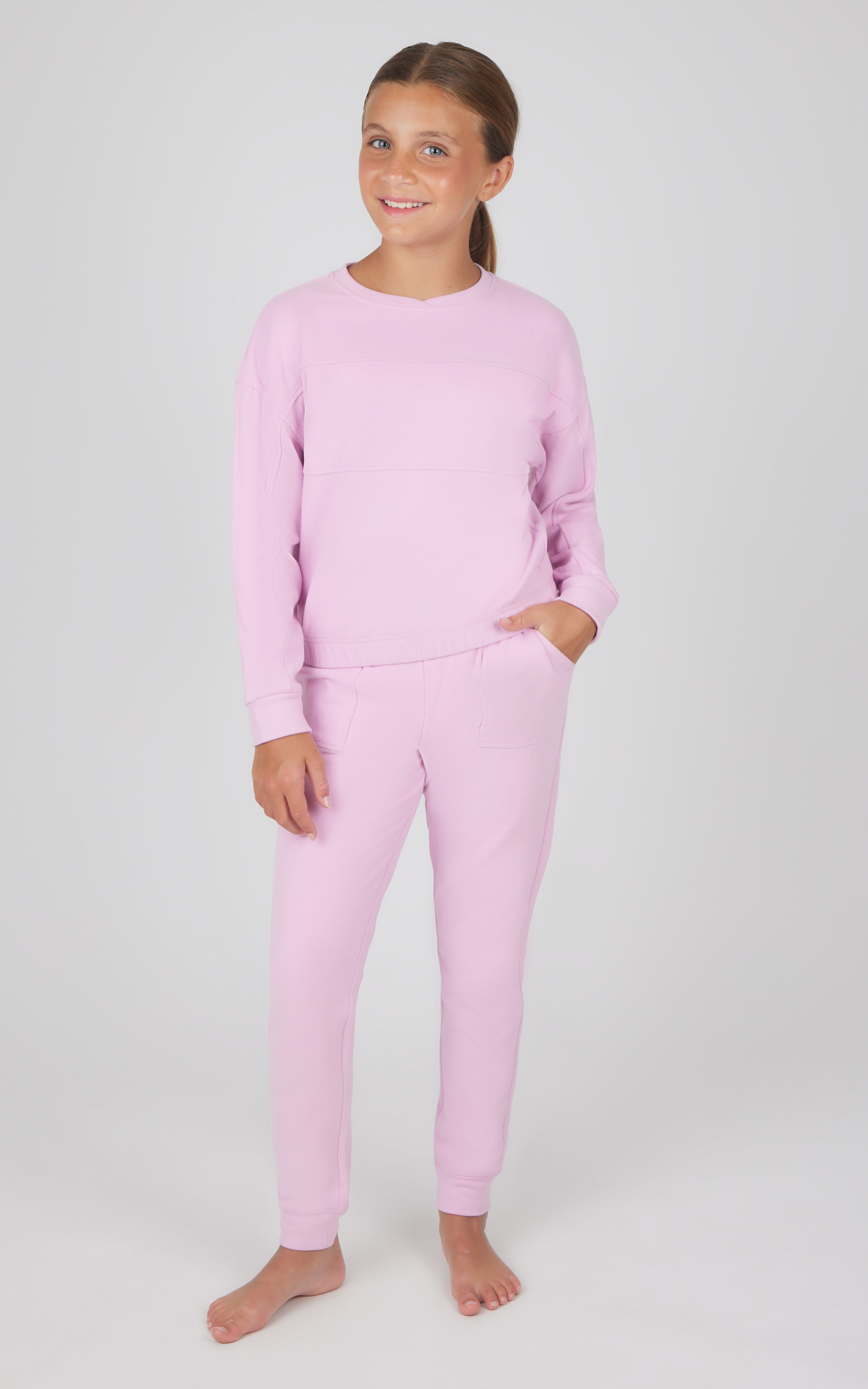 Girls melange light pink long sleeve top and jogger pants set with ribbed cuffs.