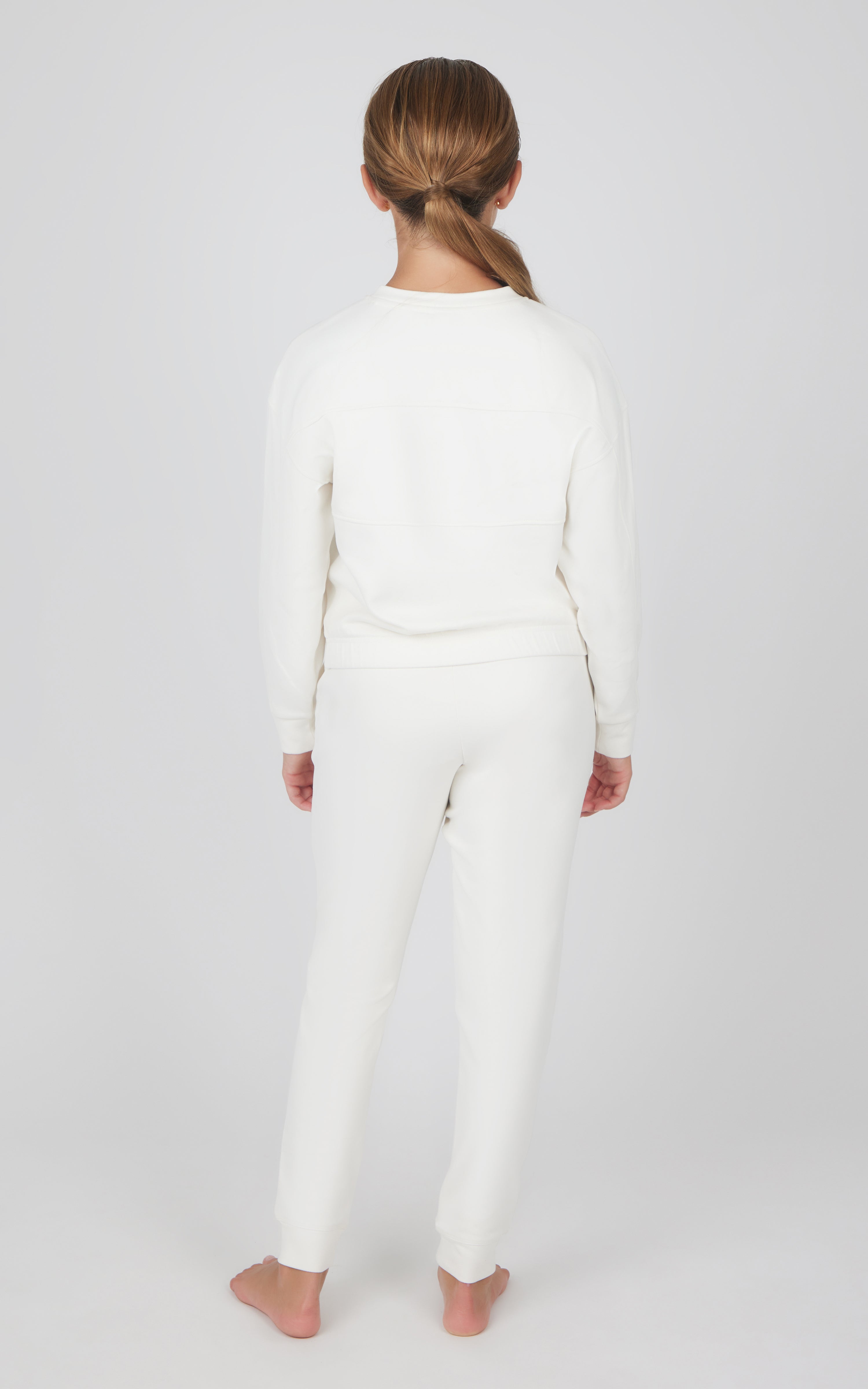 Girls white melange long sleeve top and jogger set, slim fit with ribbed cuffs and waistband.