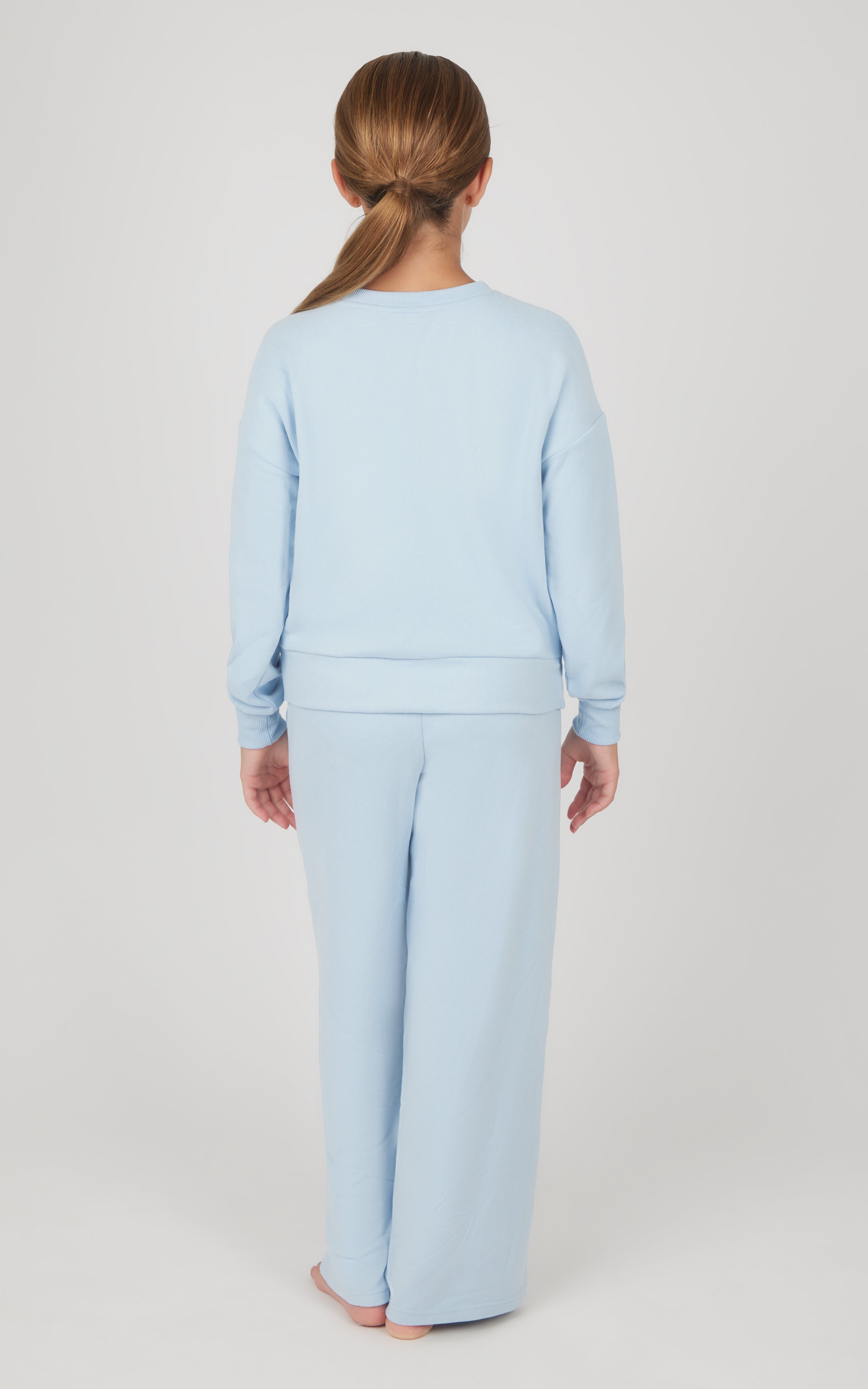 Girls light blue melange sweatshirt and wide-leg pants set, viewed from back.