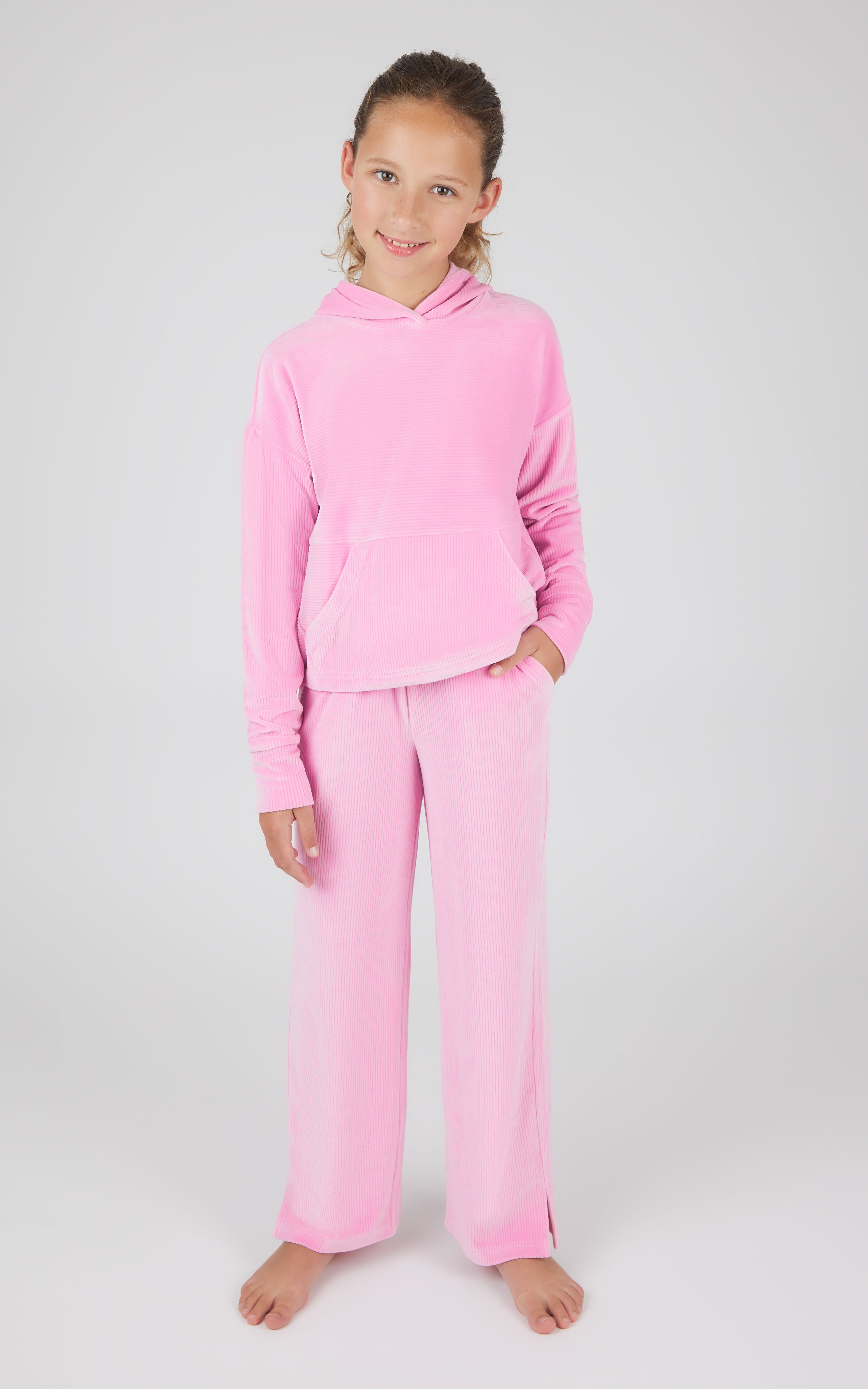 Girls ribbed velour hoodie and straight leg pants set in soft pink.