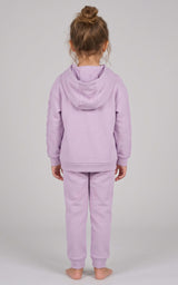 Toddler wearing a soft lavender brushed-terry hoodie and tapered joggers, shown from behind.