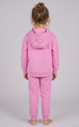Toddler wearing a pink brushed-terry hoodie and tapered joggers, shown from behind with the hood down.