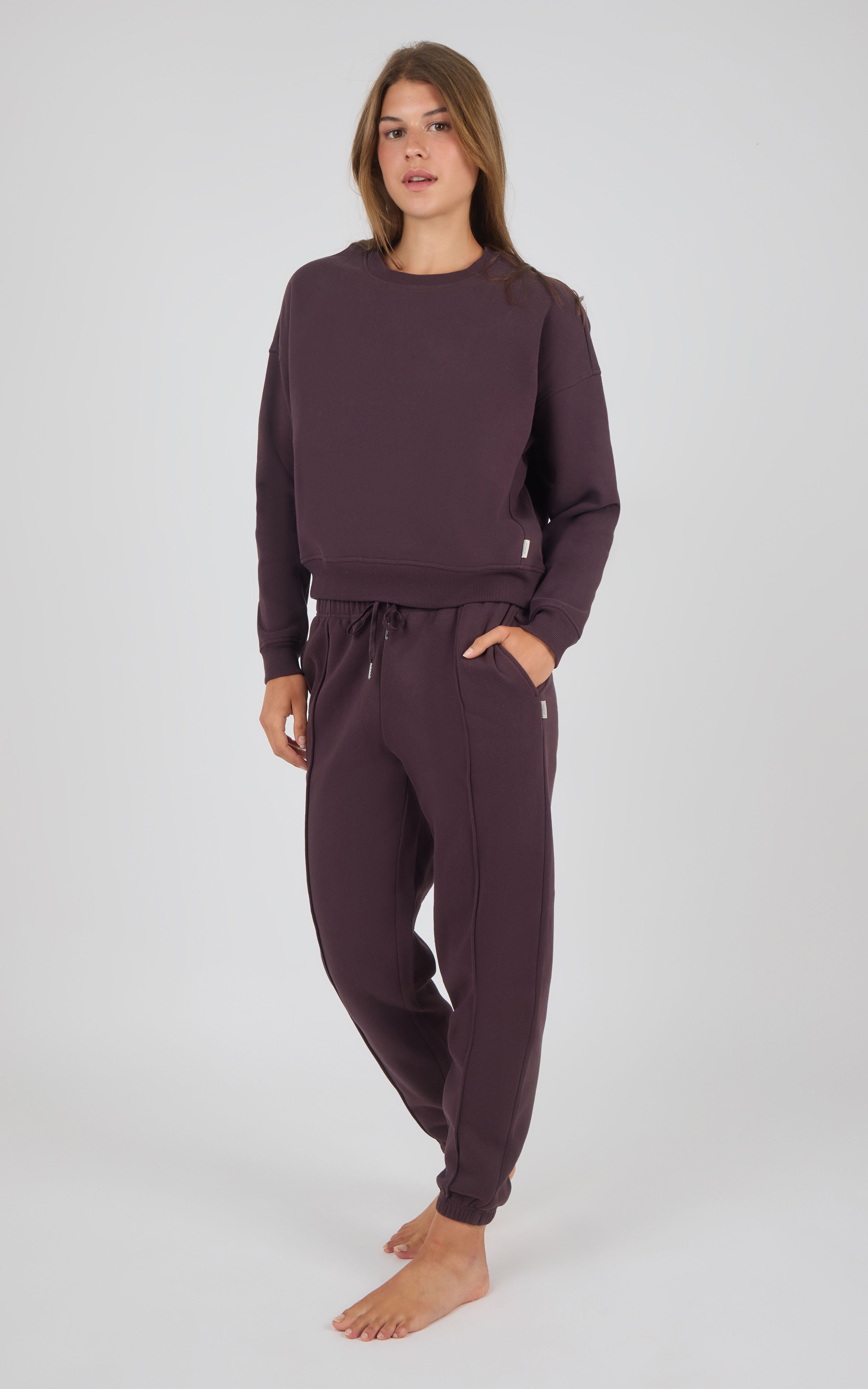 Midnight Berry long-sleeve crewneck top with matching pintuck jogger pants, relaxed fit.