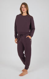 Midnight Berry long-sleeve crewneck top with matching pintuck jogger pants, relaxed fit.