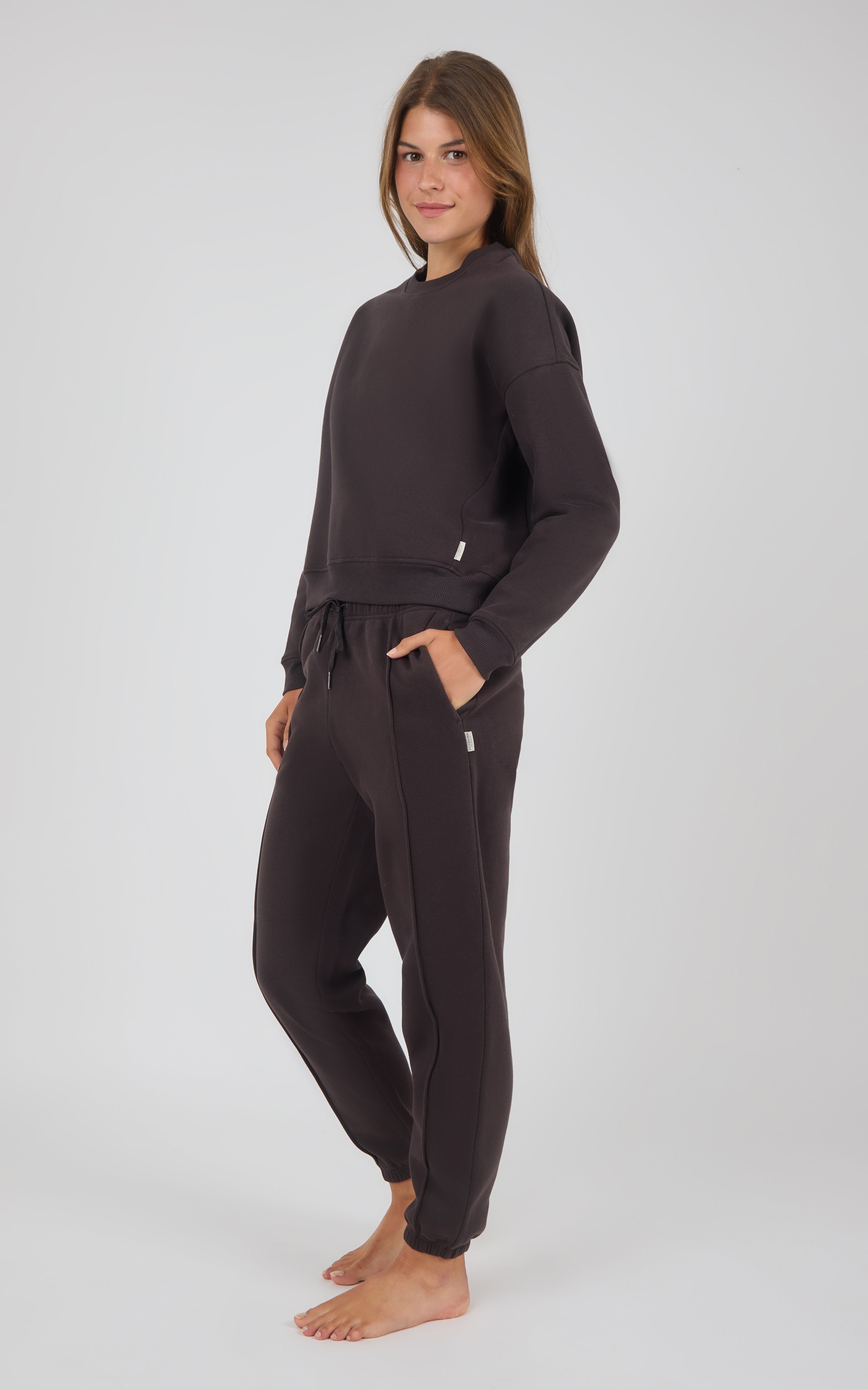 Dark coco long-sleeve pullover with matching pintuck jogger pants, casual lounge fit.
