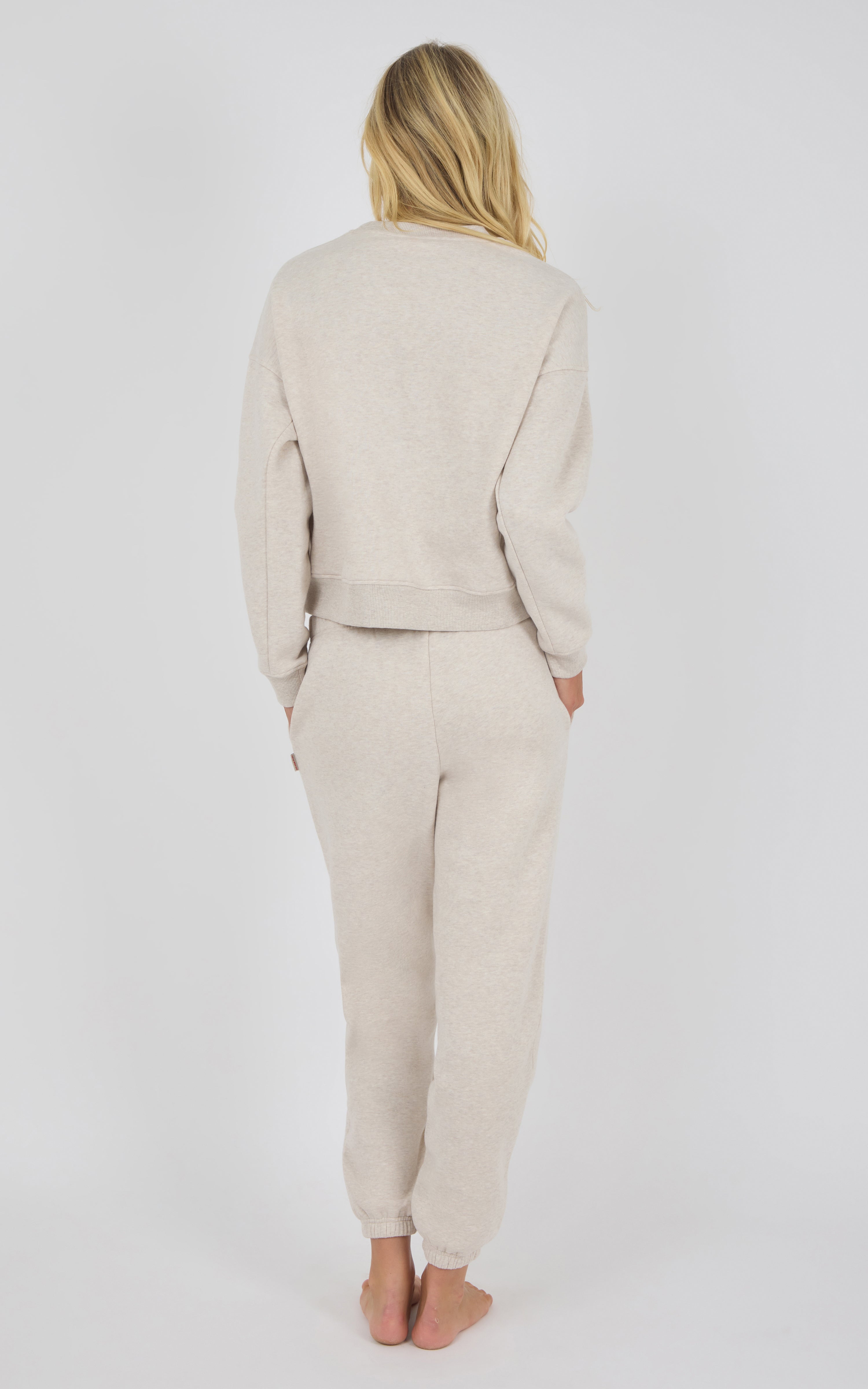 Heather oatmeal pintuck jogger pants with matching long-sleeve top, relaxed fit, soft fabric.