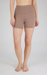 Brown high-waist 5-inch fitted biker shorts with flat seams and smooth fabric.