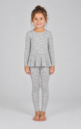 Girl wearing a grey ribbed space-dye set with a long-sleeve crewneck peplum top and ankle-length leggings.