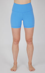 Bright blue 5-inch high-waist women's biker shorts with clean seams.
