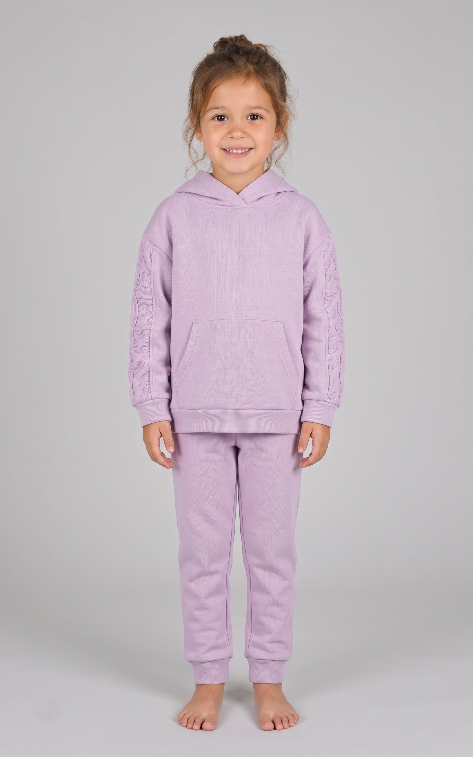 Toddler girl wearing a Fair Orchid brushed terry hoodie and jogger set with hood and ribbed cuffs.
