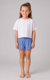 Light blue lightweight girls running shorts with flutter-style outer layer and fitted inner lining, worn with a plain white.