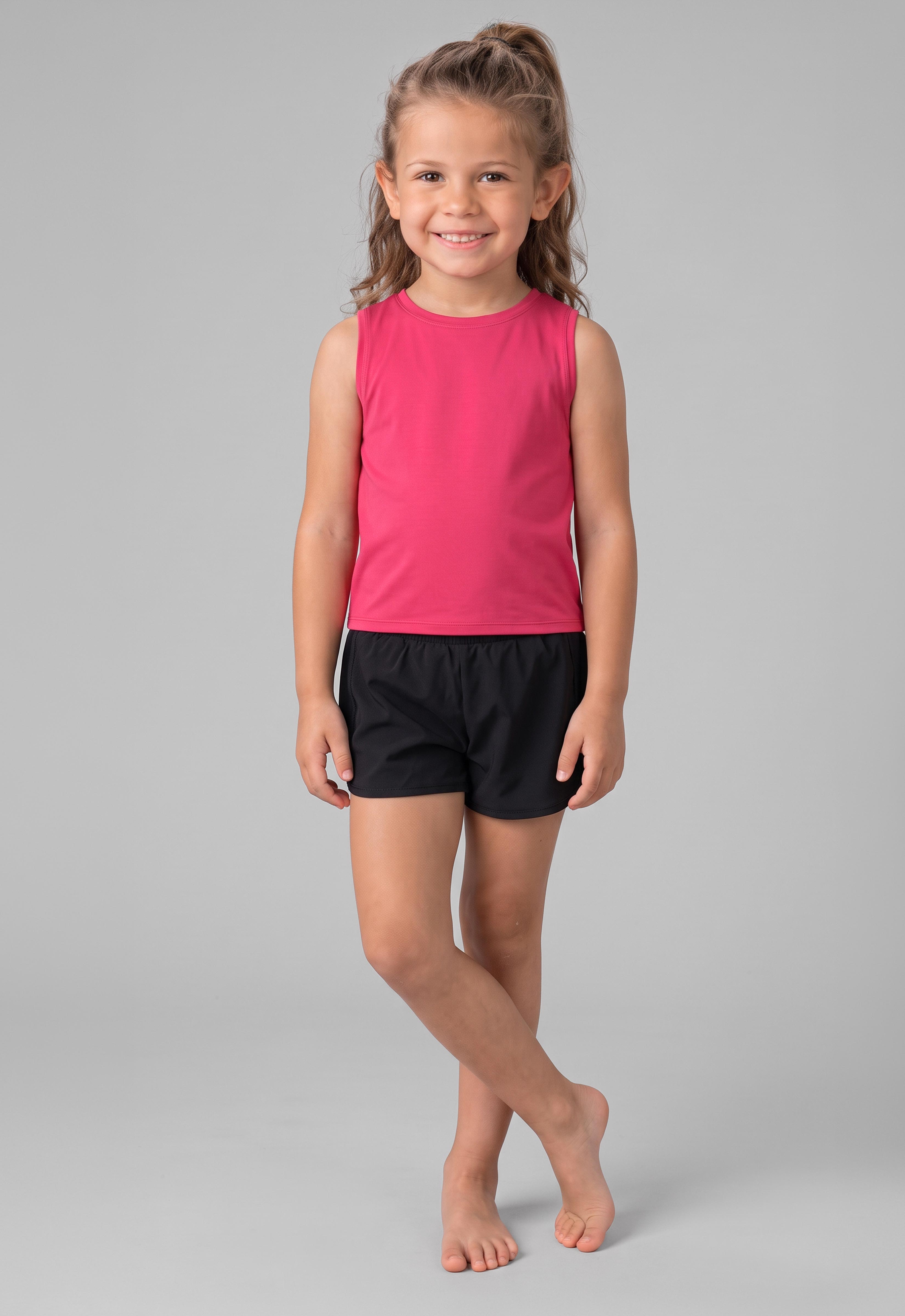 Girls sleeveless twist-front tank top in bright pink paired with black athletic shorts, soft cotton blend.