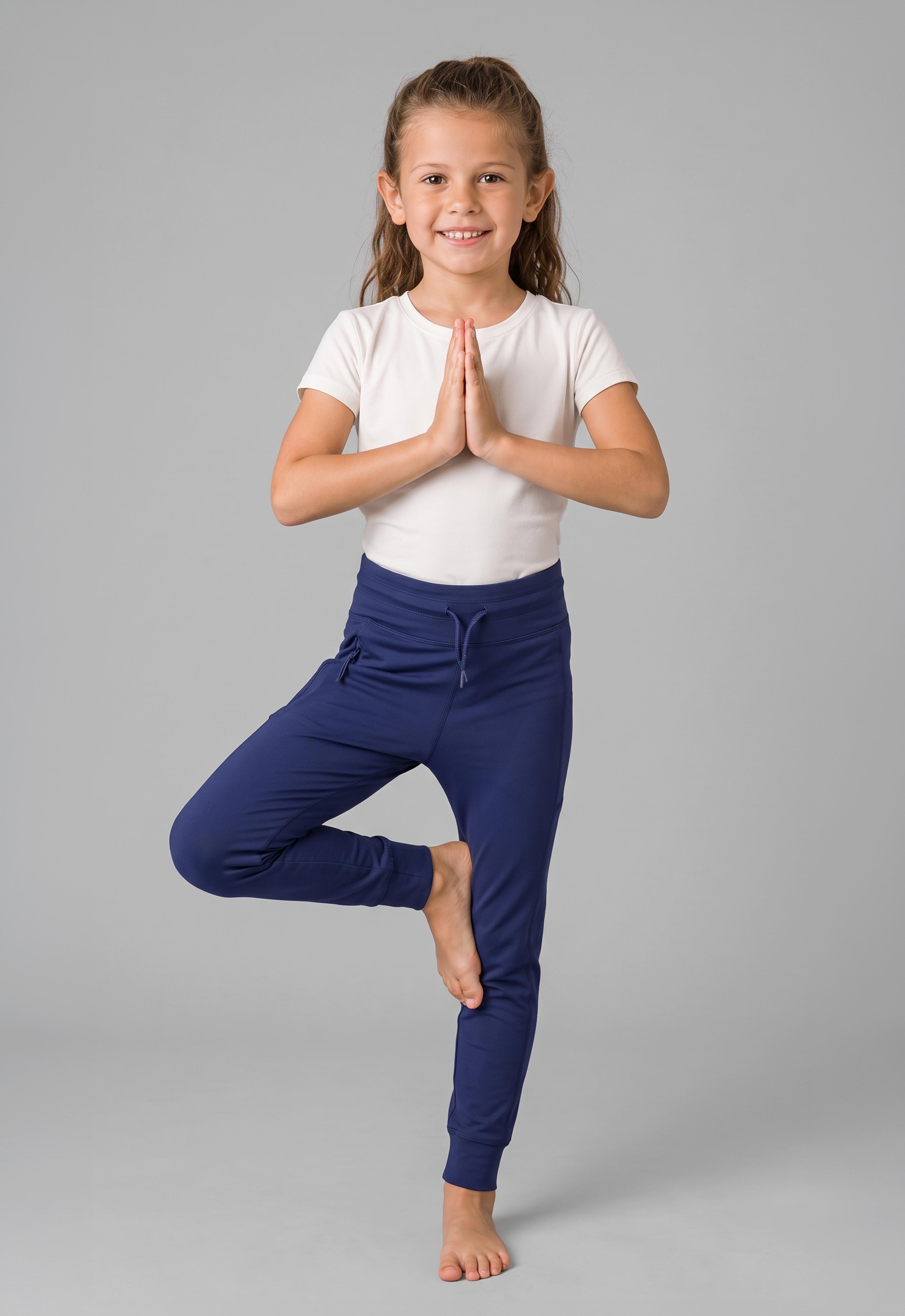 Navy blue girls jogger pants with cargo pockets and elastic waistband, soft interlock fabric.