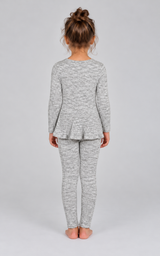 Little girl modeling a heather gray ribbed set with a long-sleeve peplum top and ankle leggings.