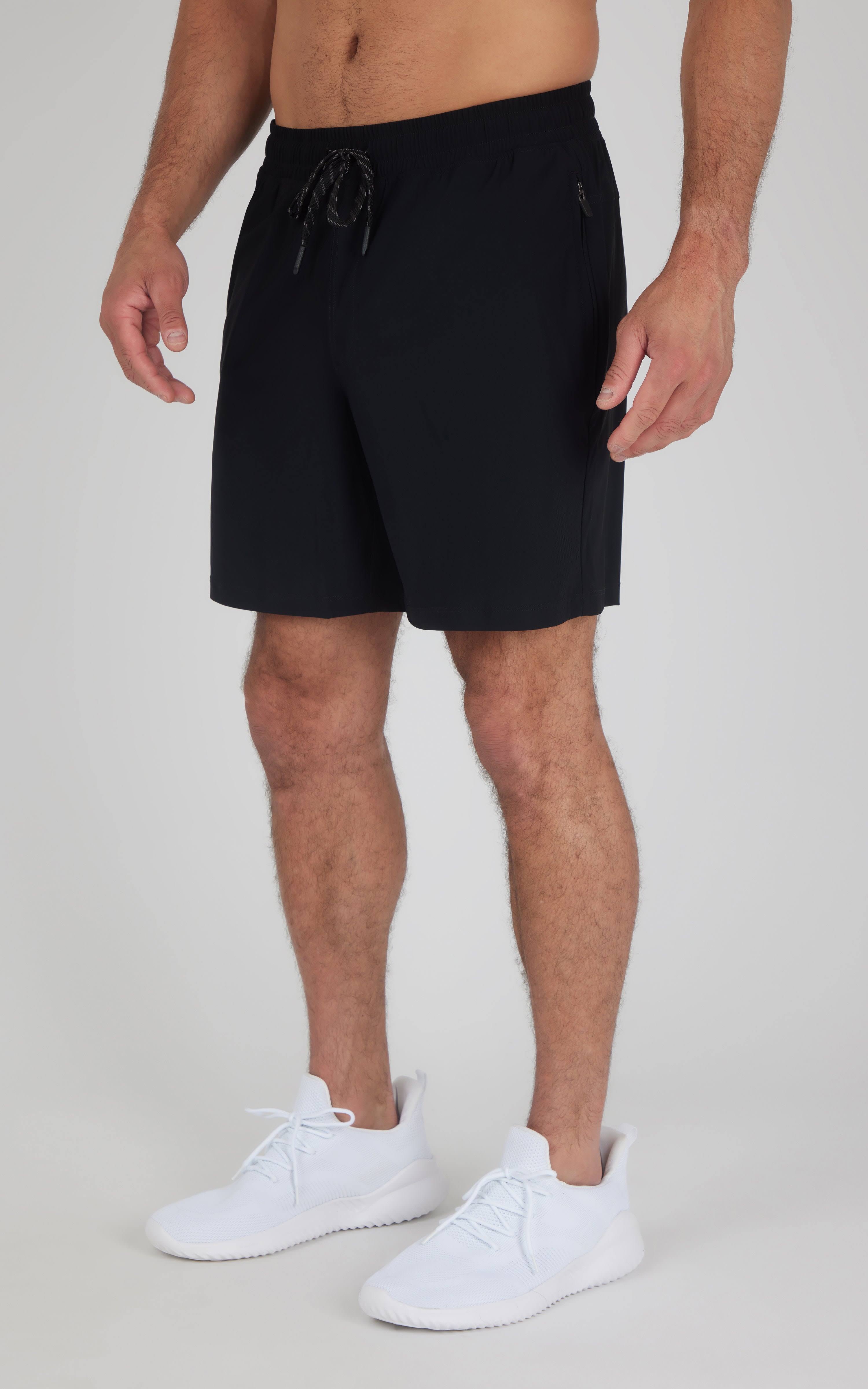 Men's black lightweight 7-inch shorts with elastic waistband and drawstring closure.