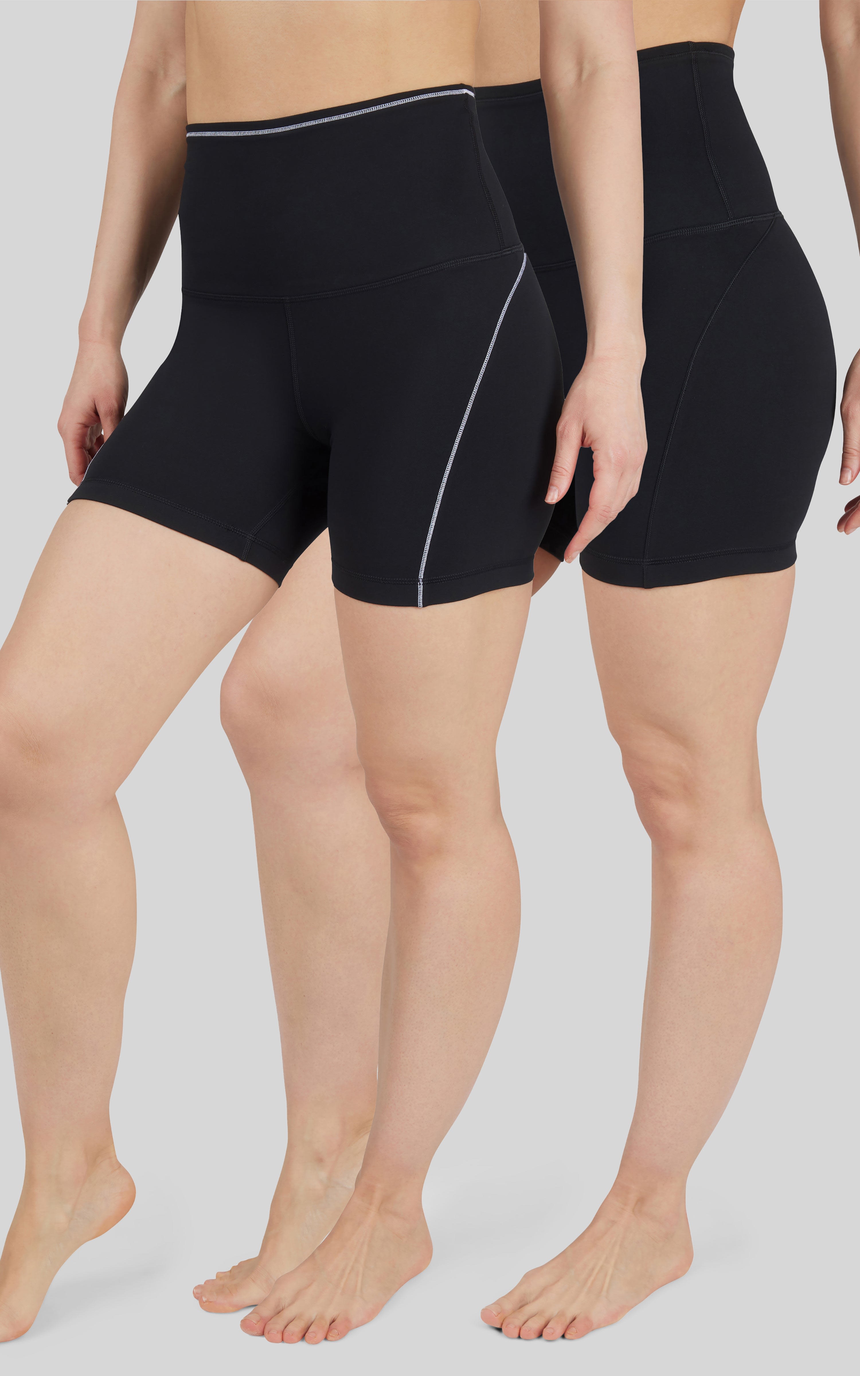 Black high-waist bike shorts with 5-inch inseam and subtle side stitching detail.