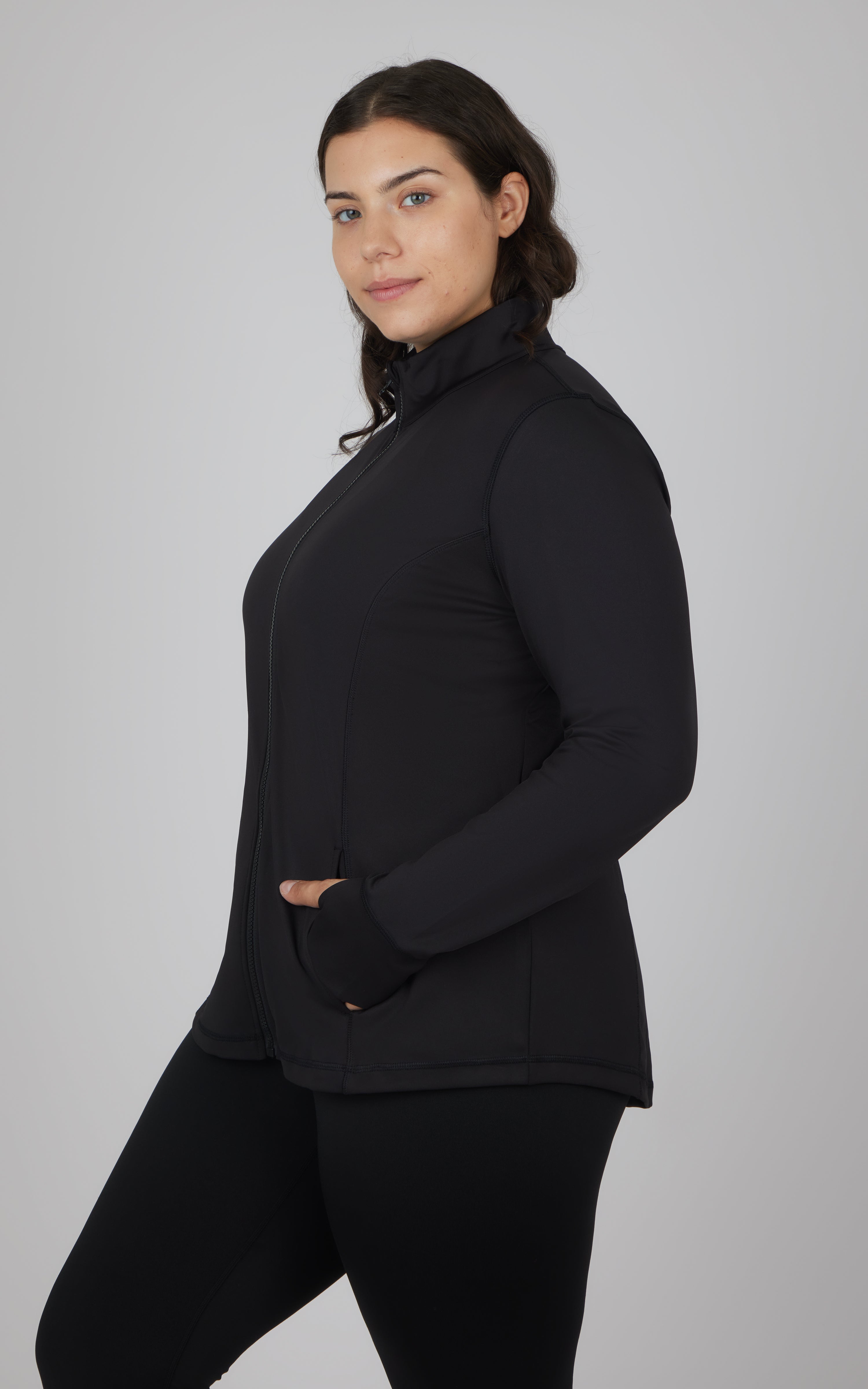 Plus size black full zip active jacket with stand collar and side pockets.