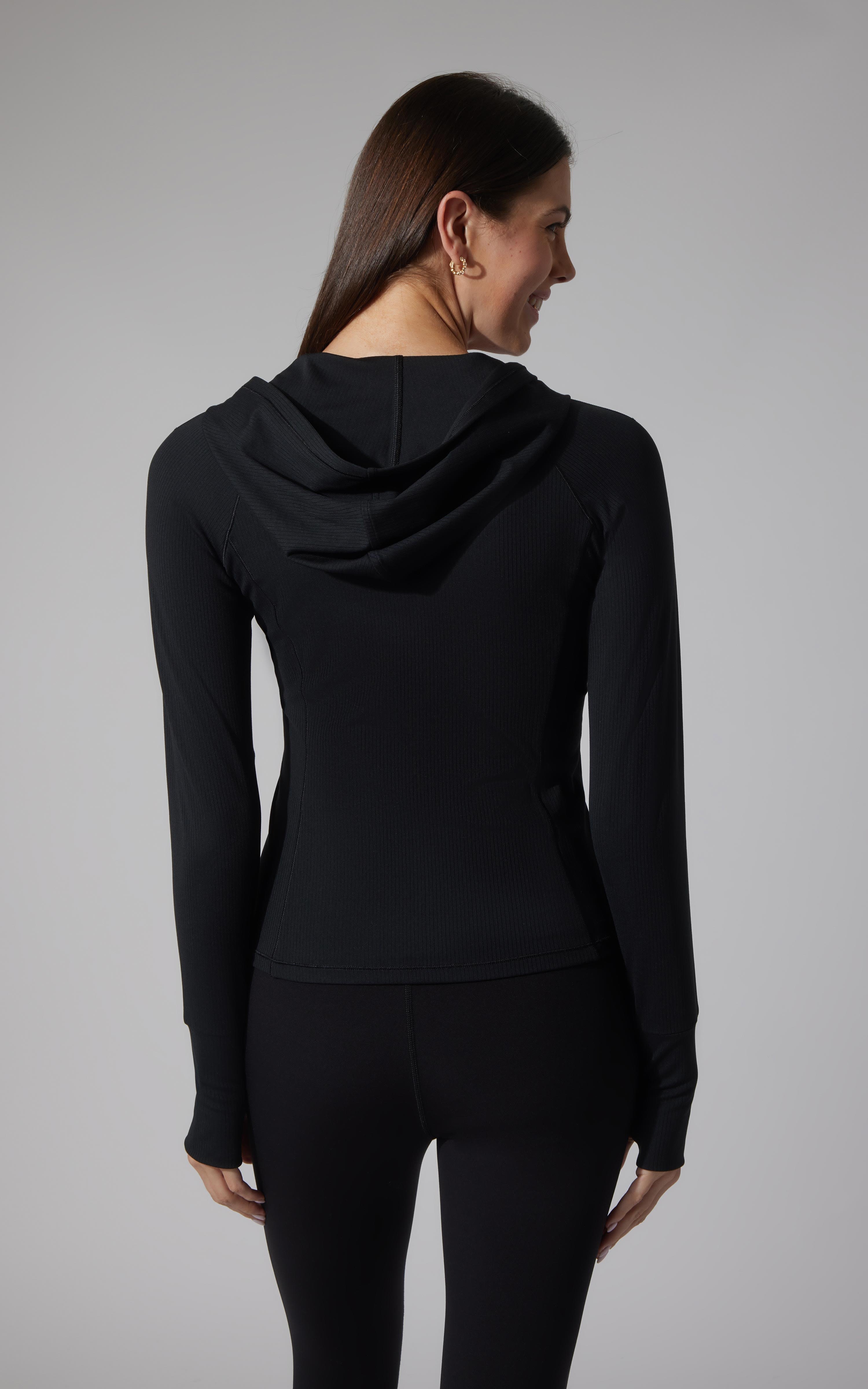 Black ribbed full zip hoodie jacket with fitted silhouette and thumbholes on sleeves.