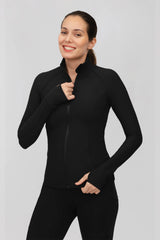 Fitted black ribbed full-zip jacket with a mock neck, long sleeves, and discreet front pockets.