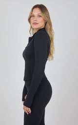 Black full-zip raglan jacket with a fitted silhouette, long sleeves, and a stand collar, shown from the side.