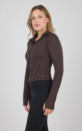 Dark brown full-zip raglan jacket with a high collar, fitted silhouette, and subtle seam detailing.