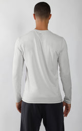Men's long sleeve crew neck shirt in light grey, shown from the back, slim fit.