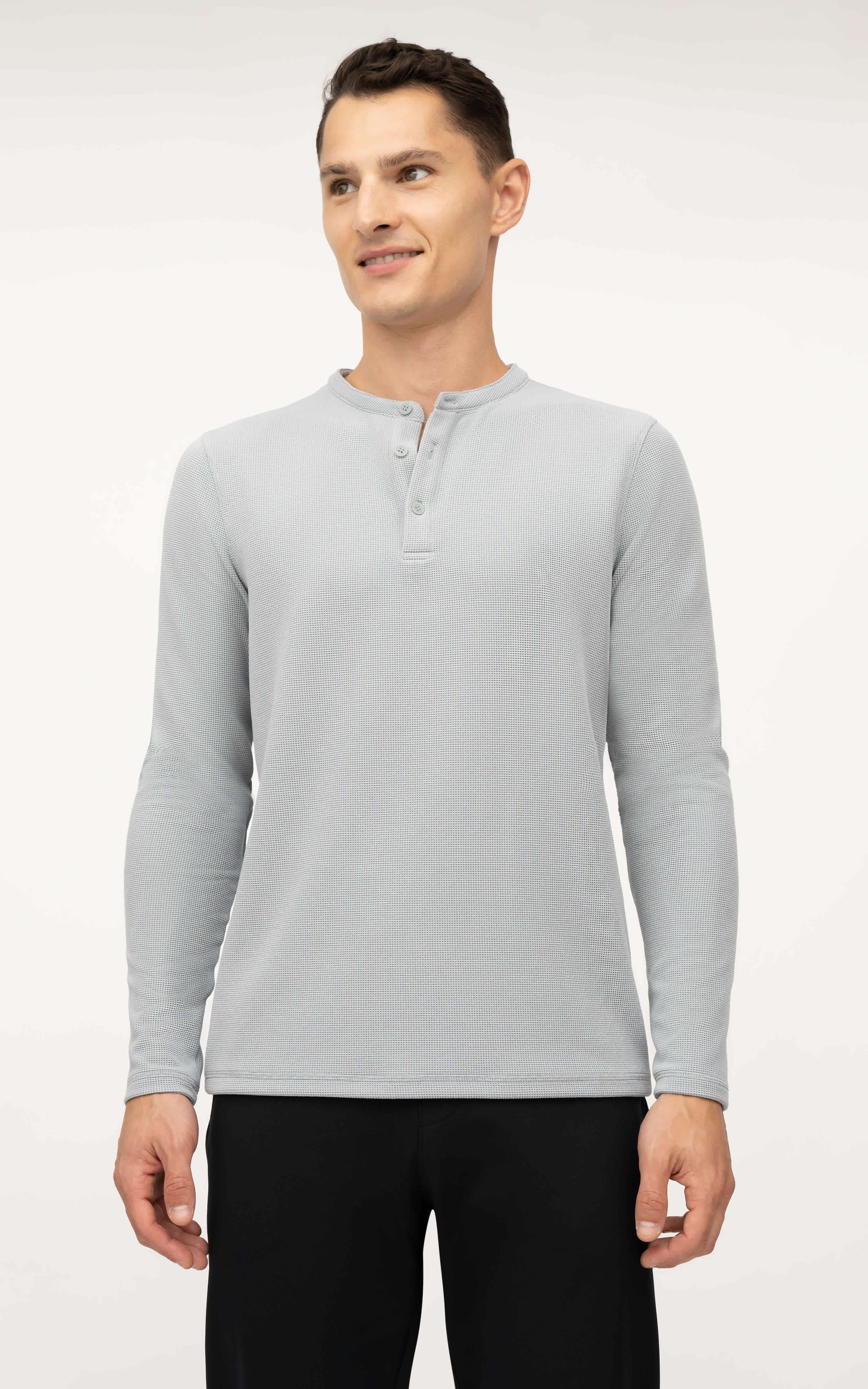 Light gray men's long sleeve Henley shirt with textured fabric and three-button placket.