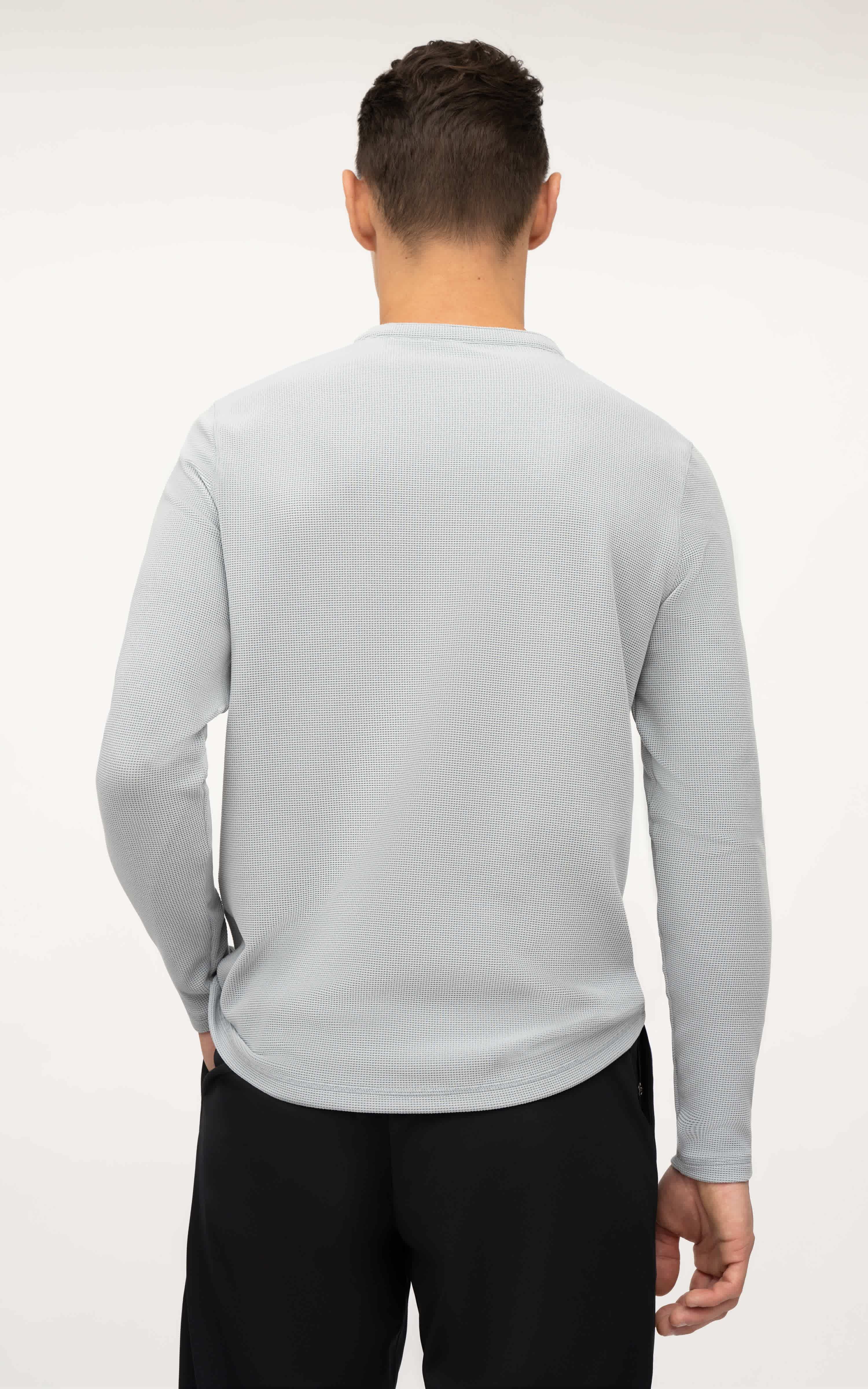 Men's light gray long sleeve Henley shirt with textured fabric and relaxed fit viewed from the back.
