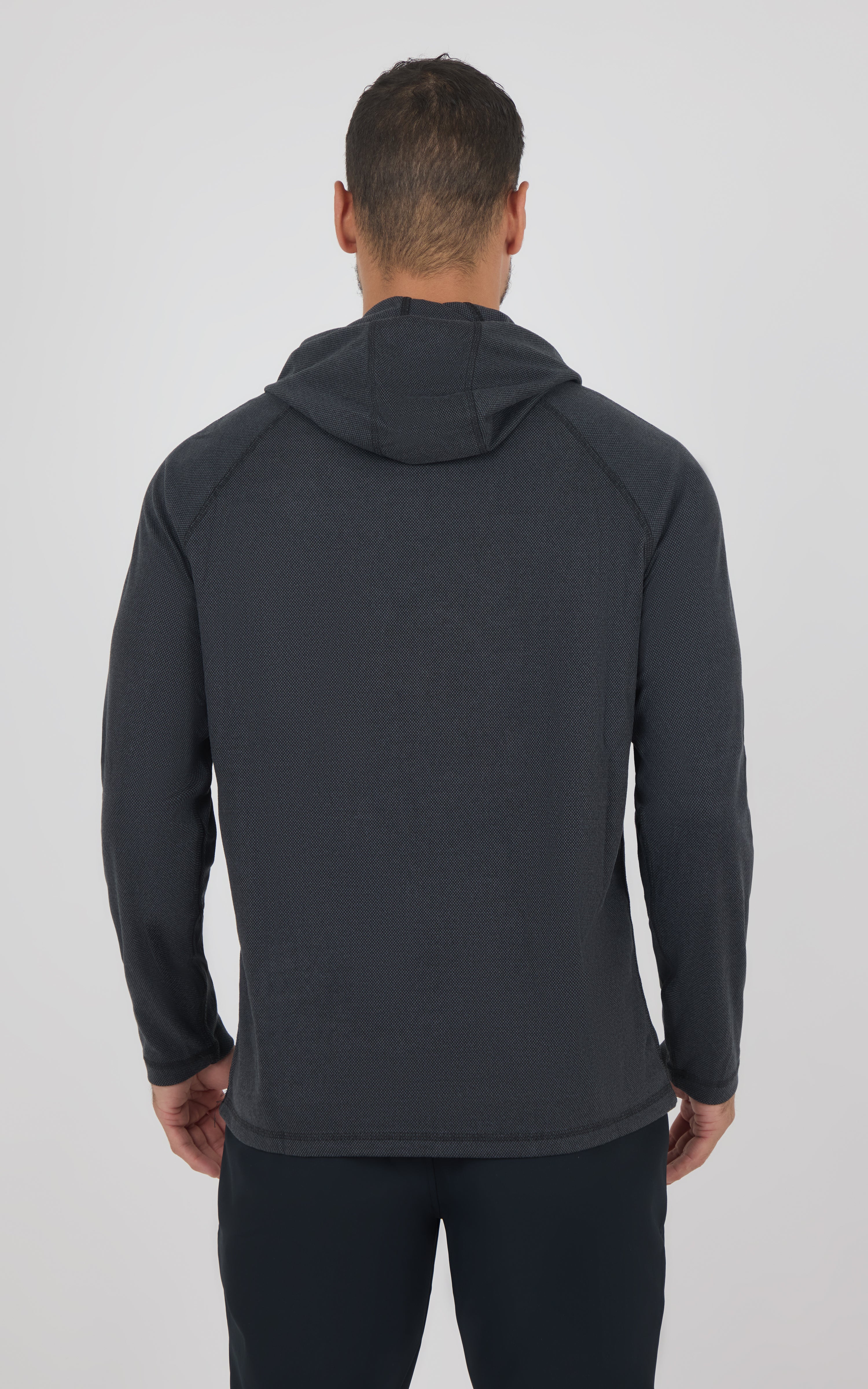 Men’s dark gray hoodie with a fitted silhouette, long sleeves, and an attached hood, shown from the back.
