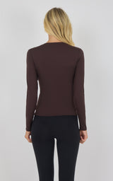 Long sleeve fitted top in chocolate torte brown with crew neckline, shown from back.