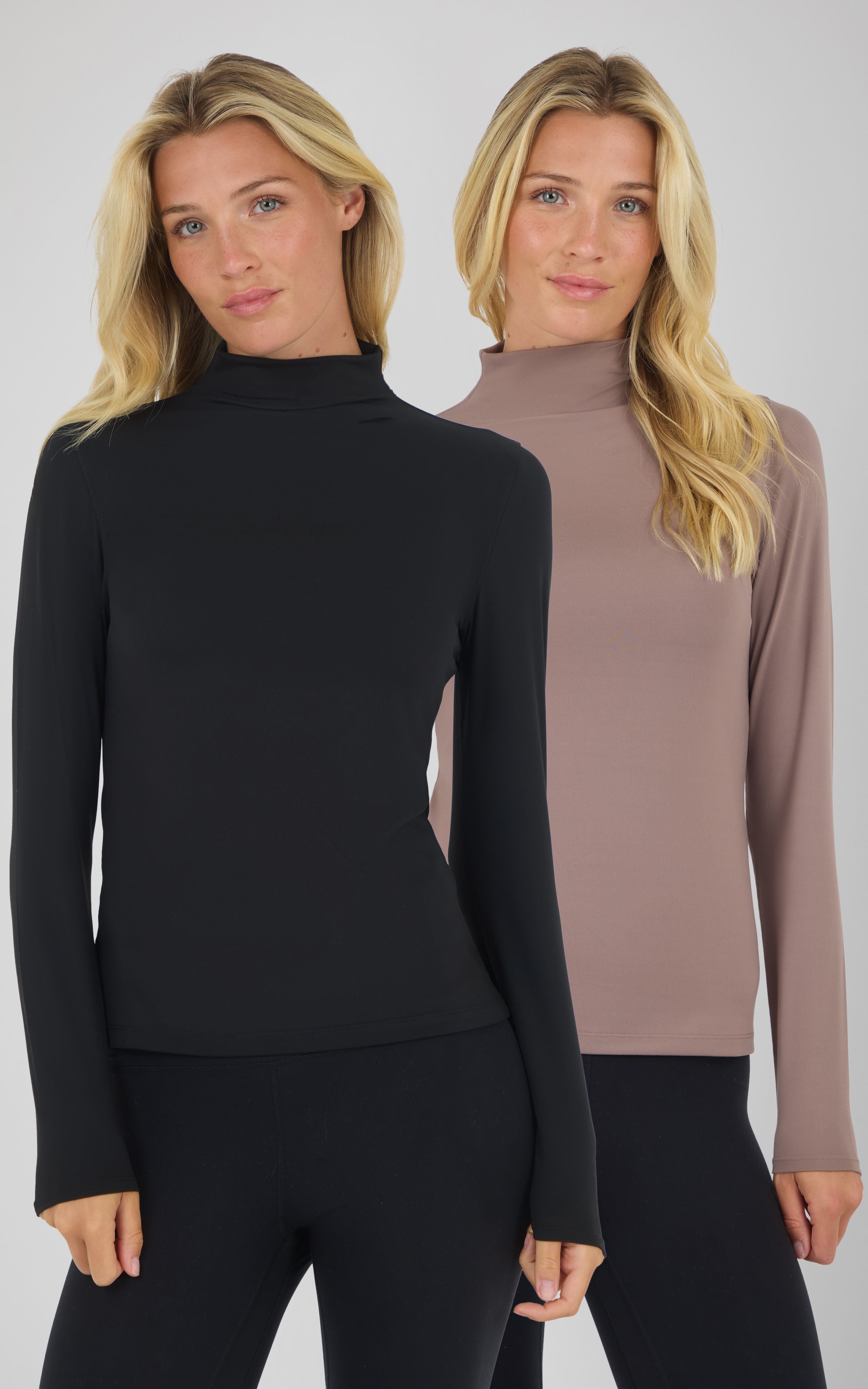Two women wearing Zenly Evelyn mock neck long sleeve tops in black and deep taupe, fitted silhouette.