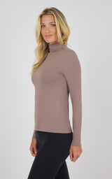 Long-sleeve mock neck top in deep taupe with a slim fit and smooth fabric finish.