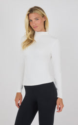 White mock neck long sleeve top with slim fit and ribbed texture.